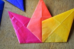 Folded paper glued together.