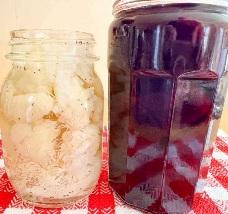 Jars of pickled cauliflower and pickled beets.