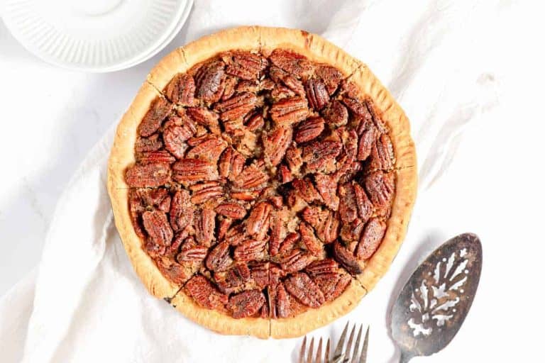 A bourbon pecan pie with a flaky crust and rich pecan topping.