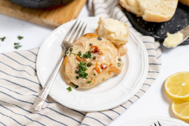 Chicken piccata on a plate.