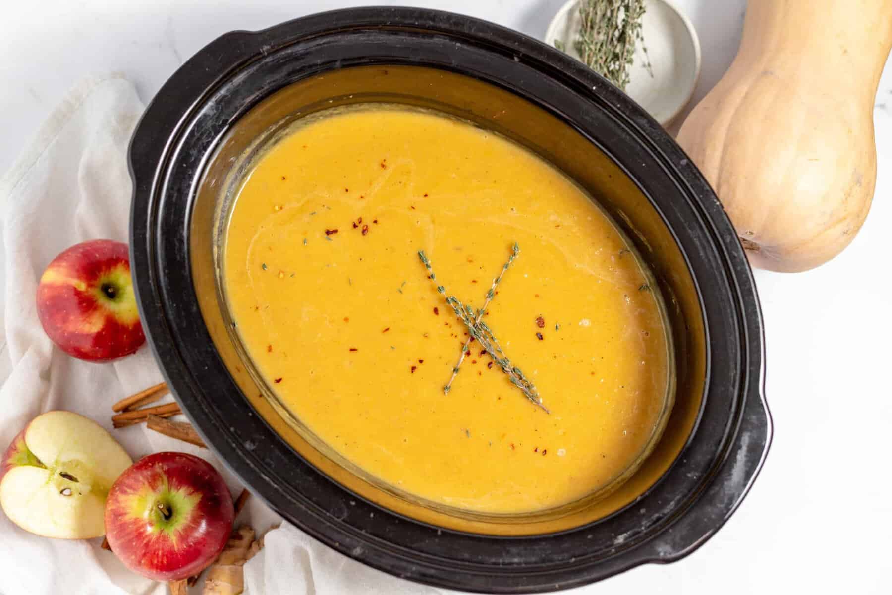 A crock of butternut soup. 