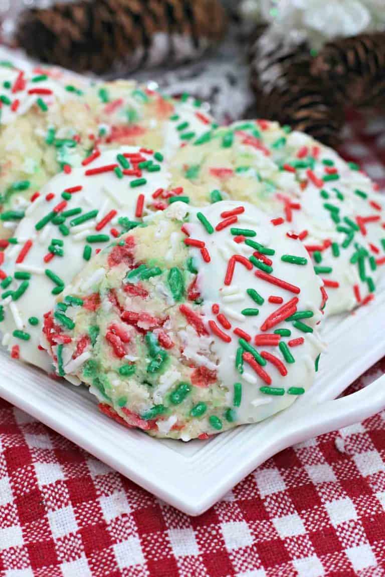 Christmas cookies with icing and sprinkles.