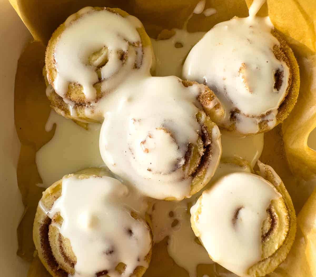 A pan of little spiral pie crust cookies.