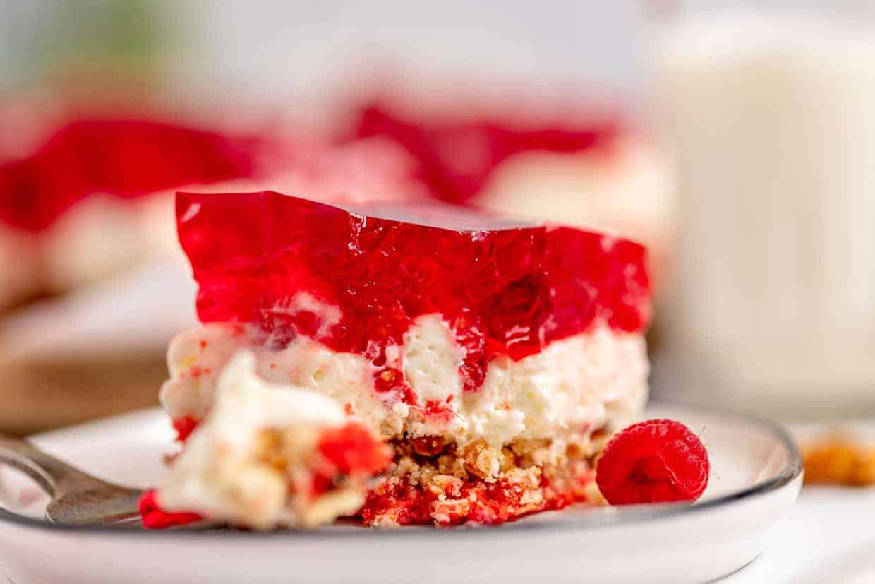 Triple layer pretzel salad with raspberries. 