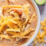 Close-up of chicken tortilla soup in a bowl.