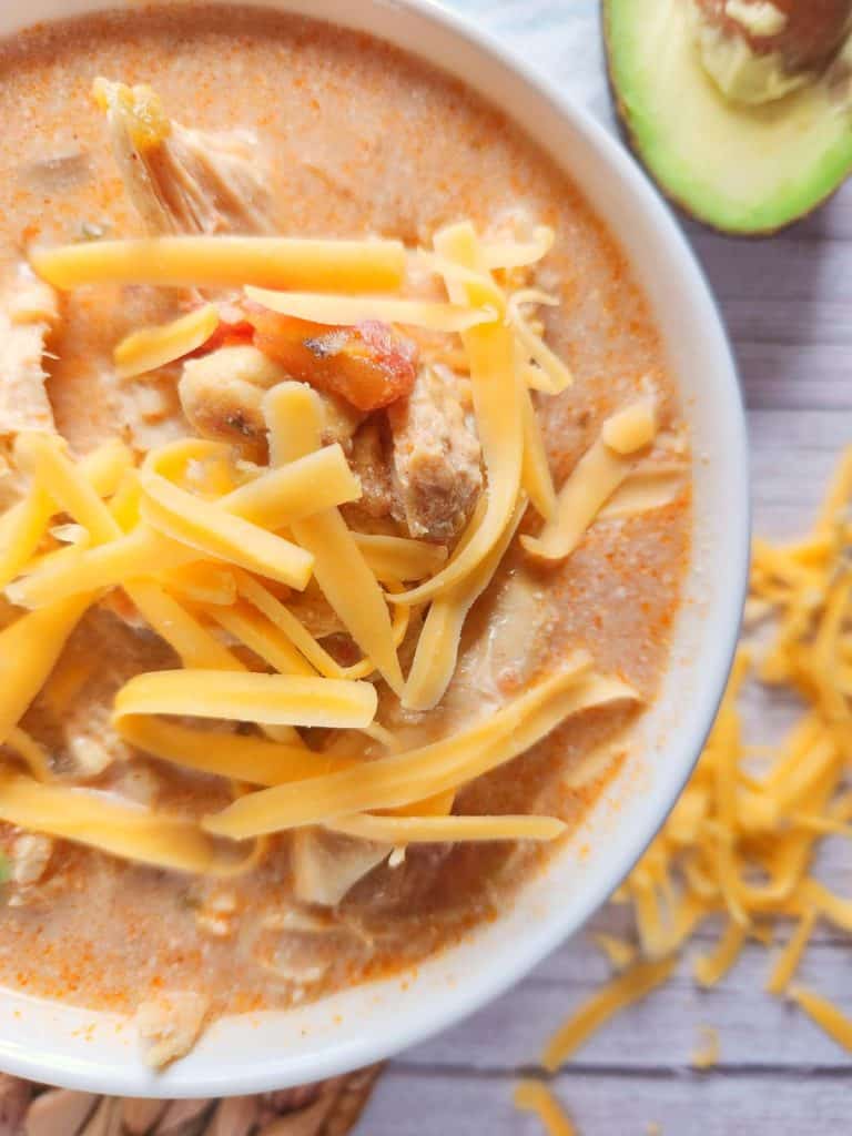 Close-up of chicken tortilla soup in a bowl.