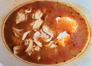 Shredded chicken added to the chicken tortilla soup.