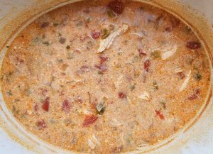Chicken tortilla soup simmering in the slow cooker.