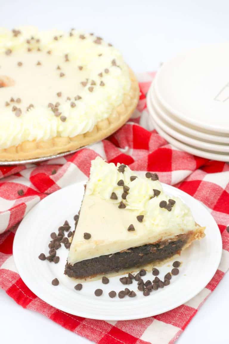 Granny's chocolate pie slice with whipped cream and chocolate chips.
