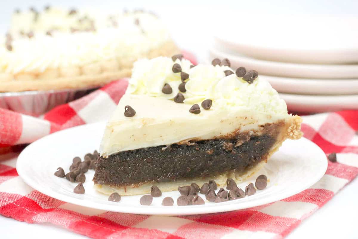 Granny's chocolate pie slice with whipped cream and chocolate chips.