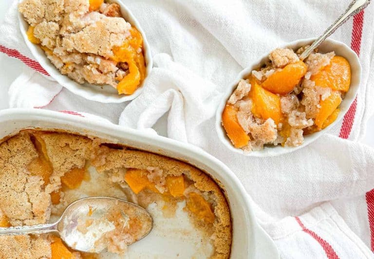A baking dish of peach cobbler.