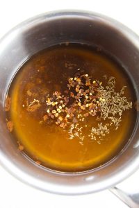 Pot of brine with spices.