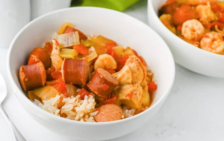 Jambalaya served in a white bowl.