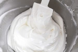 Bowl of smooth royal icing ready for decorating.