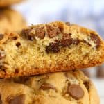 Cookie broken in half showing soft, gooey center.