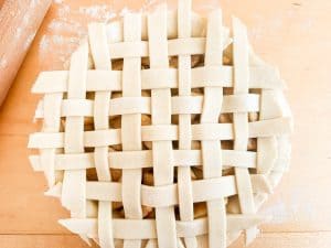 Fully woven lattice pie crust ready to bake.