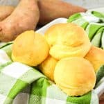 Close-up of sweet potato rolls showing smooth, lightly browned tops.